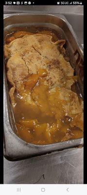 Peach cobbler  made from scratch  and fresh fruit