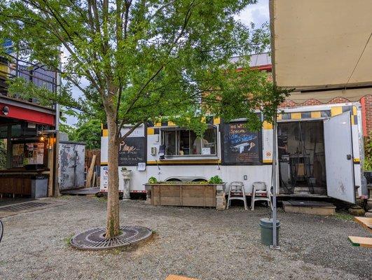 Outside. Roquette food truck at the beer garden.