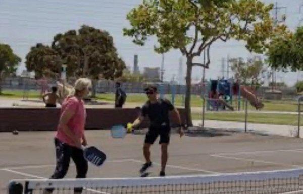 People playing pickleball at Edison Park, Huntington Beach.