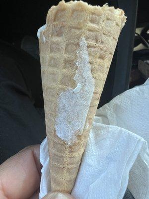 Paper stuck to cone