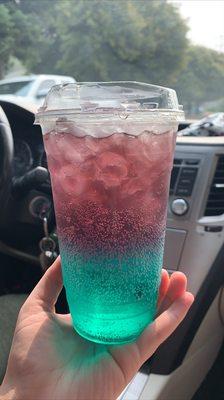 Lotus Drink - Blue Lotus, Coconut, Blue Ras, Lime and Pomegranate Drizzle