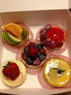 berry tarts, lemon tart, and cheesecake ! delish!