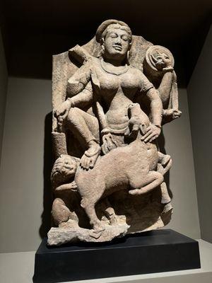 Durga killing the demon cow