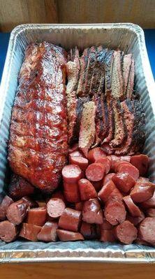 1 brisket, 1 rack of ribs, and 2lbs of smoked sausage.