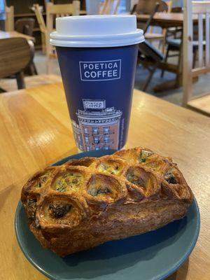 Chai latte with oatmilk and extra shot of espresso. Paired with spinach feta danish.