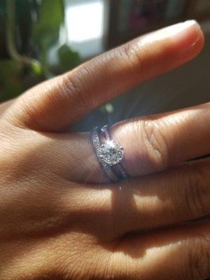 My engagement ring with grandmother's diamond.