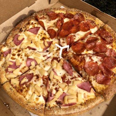 Half extra pepperoni, half ham and pineapple. Current Large Tastemaker special 11 bucks.