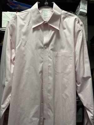 Wrinkled shirt with collar not ironed.