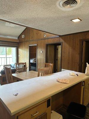 Kitchen looking towards bedrooms and bathroom and patio.