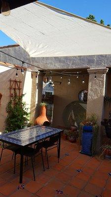 Nick installed a sun sail/shade in my courtyard (another angle)