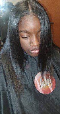 Silky shiny healthy flowing natural hair.