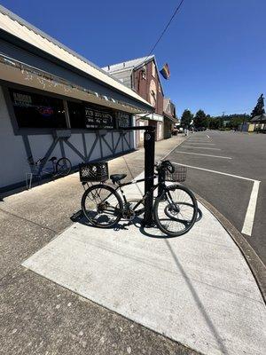 Front of Pub 210 East with bike repair and maintenance station.