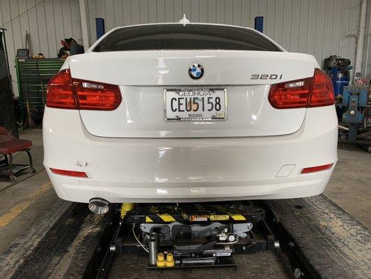 BMW 320i in for a custom cat back exhaust with a 4" double wall stainless tip!!