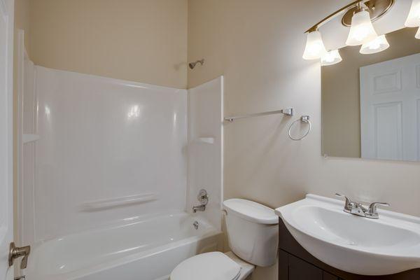 fresh shower surround and glazed tub to give this bathroom a full makeover