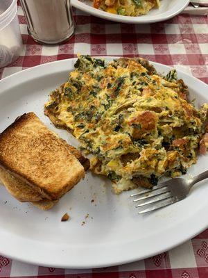 Omelette home fries and toast