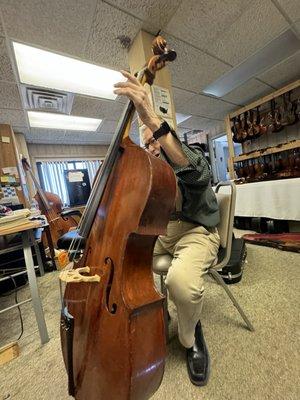 Peter checking out my cello.