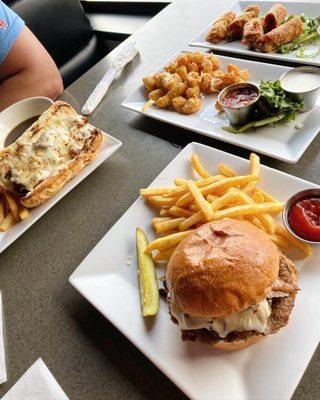 Prime Rib Sandwich (front), Italian Beef (left), Fried Wisconsin Cheese Curds & Reuben Rolls starters (right)