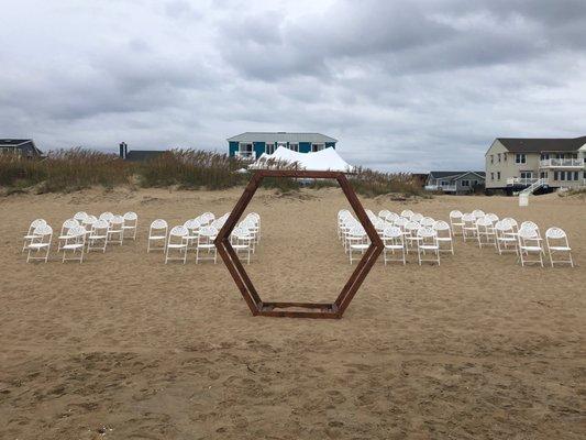 Ceremony arch and chairs