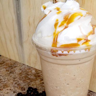 Pot O' Gold Frappe, White Chocolate, Caramel Sauce, Extra Shot and Home Made Whipped Cream.