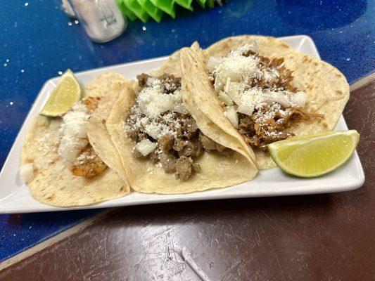 Shrimp taco, steak taco, carnitas taco (left to right)