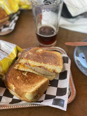 Elton's Big Sausage Melt Sandwich + pickled onion