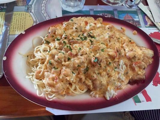 Snapper Classico with crab meat and crawfish in wine sauce. Perhaps the best dish on their menu.