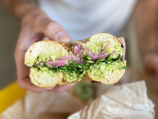 The Millennial on A garlic onion bagel