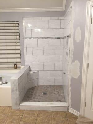 Stand up shower with bench and notch for soap/razors