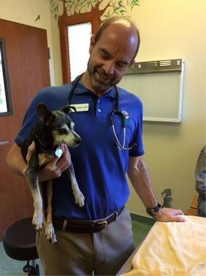 Dr. Steve Amsberry bonds with a "super senior" patient during a preventive healthcare exam.