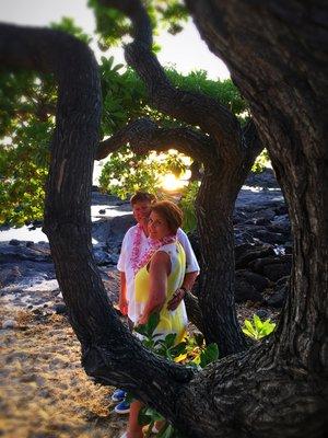 A peek-a-boo shot captured post Classic Simple Kona Beach Wedding.