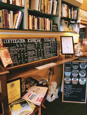 What the inside looks like post-COVID: indoor seating area is now covered with adorable chalkboards and books for sale