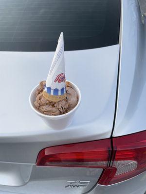 A small sugar cone of Milky Way ice cream in a cup :)