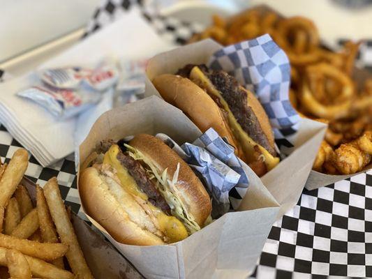 Cheeseburgers. Fries. Curly fries.