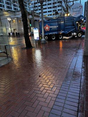 Republic services vehicle making an illegal right turn at the corner of SW 6th and Salmon downtown, Portland, Oregon.