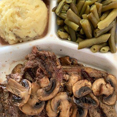 $10 ribeye steak with sautéed mushrooms and real mashed and green beans