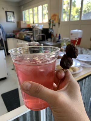 Watermelon strawberry water with a side of cake pop on a stick