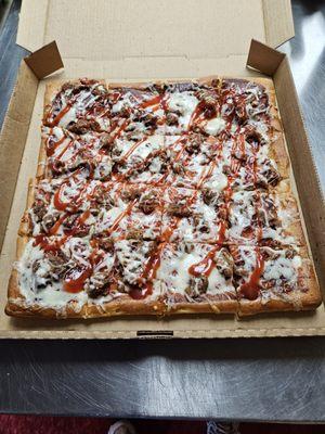 Our Specialty Pizza, Gem City Pizza topped with Baby-Boyz Pulled Pork and Signature Sauce