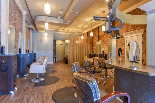 Full Salon picture.  Total remodel.  Removed all existing walls and floors.
 Exposed the brick, and total build out in just 8 weeks.