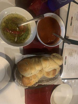 Homemade garlic knots w/ marinara sauce and garlic olive oil.