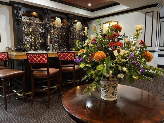 Lobby flowers and bar.