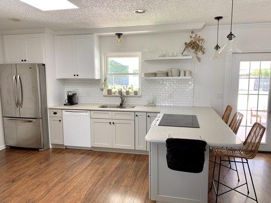 Better view of the this side of the kitchen!  They also removed the soffit, to allow room for the open shelves and longer set of cabinets.