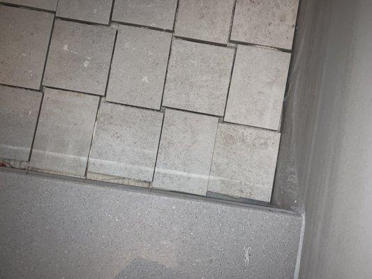 No joint at all in areas of shower stall tile