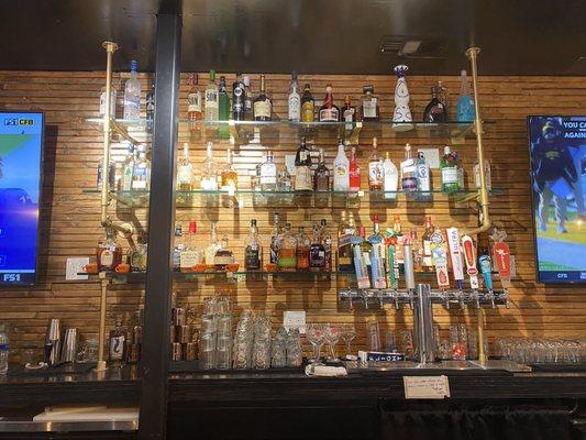 Full bar with an impressive selection of spirits