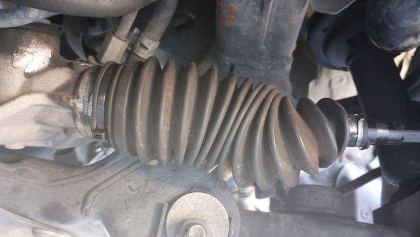 Twisted, crumpled tie rod boot