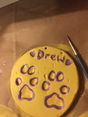 This is Drews paw print that was made from her right after she passed.  My daughter loves it we baked it and she painted i