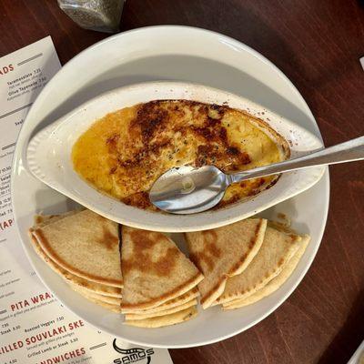 Saganaki (a sort of sweet kasseri cheese flambéed with bourbon wine lemon!)--all served with much pita!