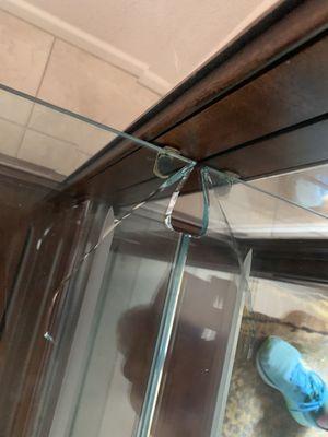 Glass shelf that was broken on the corner