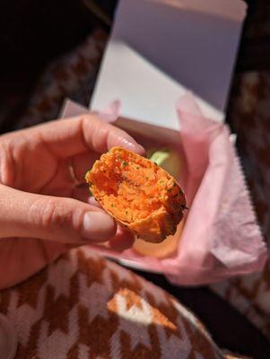 Inside view of the mango macaron