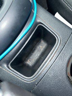 Just got my car washed today and look, they didn't even move the car keys to clean under . Or for my cup holders