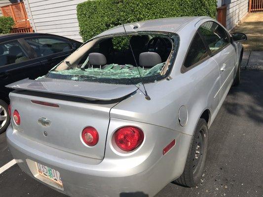 Car windshield broken by golf ball